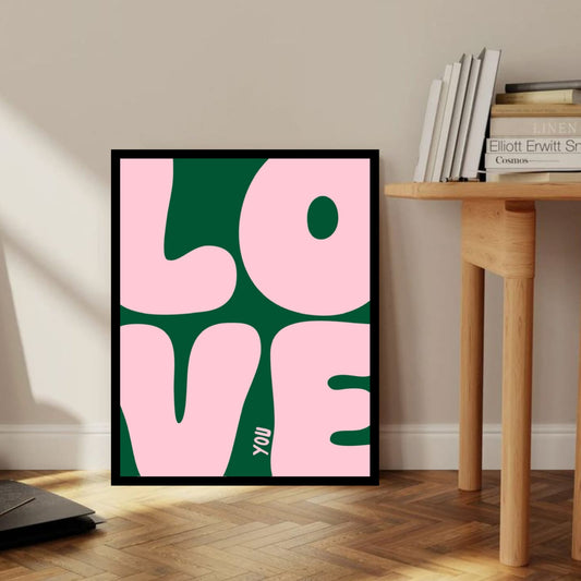 Love You Bold Pink and Green Typography Wall Art Frame with oversized bubble letters on forest green background